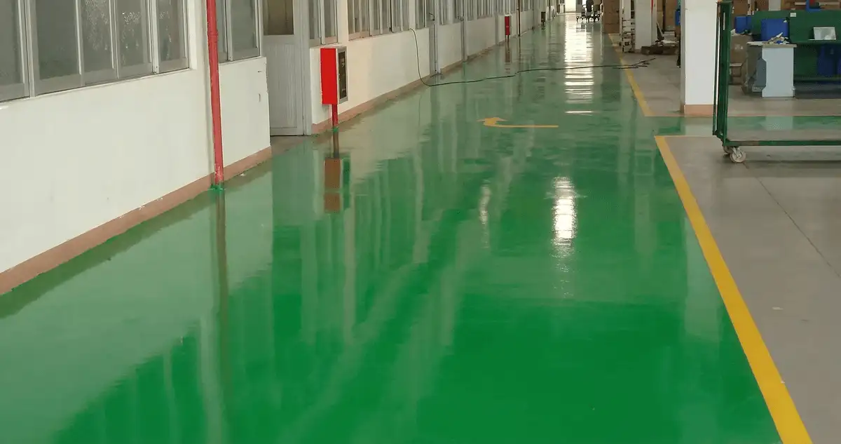 A factory floor professionally covered and marked with epoxy flooring in Worcester, MA