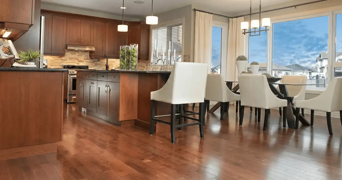 A modern kitchen with professionally installed wood flooring in Worcester, MA