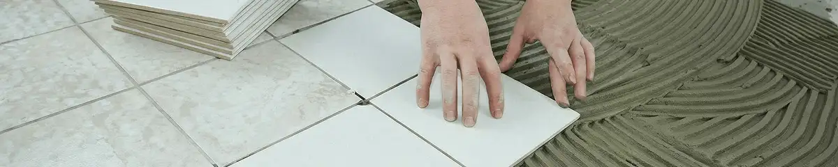 Professional installing white tile floors in Worcester, MA