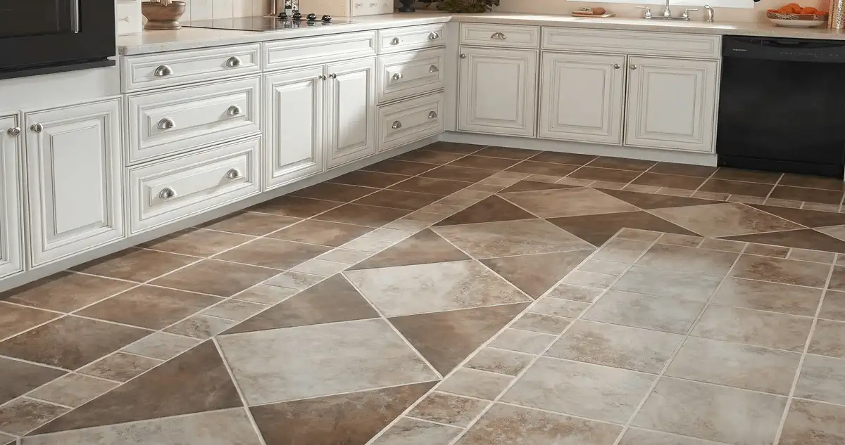 Kitchen with white cabinets and a professionally installed tile floor in Worcester, MA
